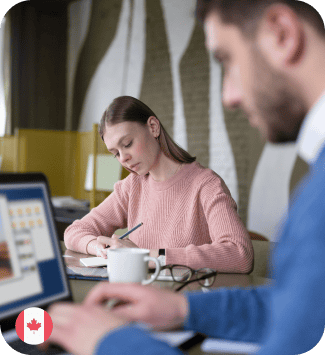 Young professionals coding in a modern office environment.